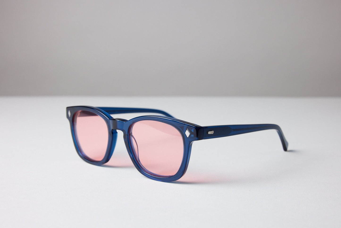 NEW YORK EYERISH, Castlerock. Blue Frame with Rose Colored Lenses