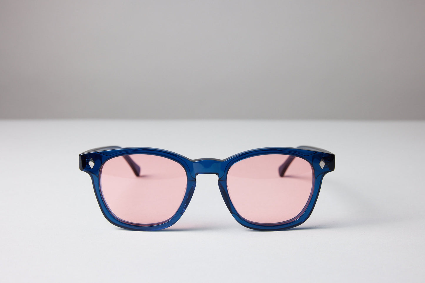 NEW YORK EYERISH, Castlerock. Blue Frame with Rose Colored Lenses